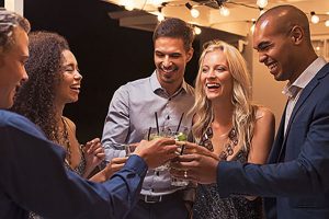 coworkers toasting at holiday party