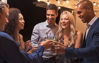 coworkers toasting at holiday party