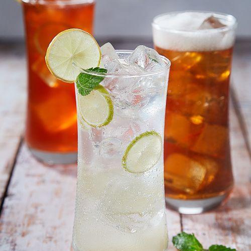 beverages on a table, one glass lemonade and two glasses tea